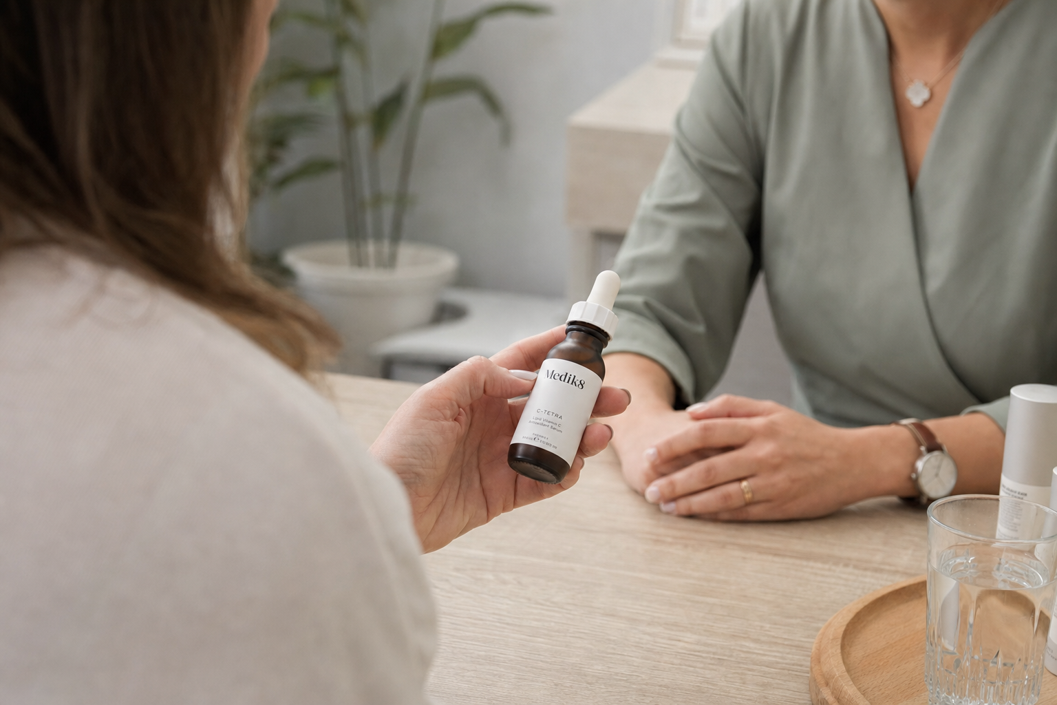 Close candid view of skincare serum being applied during a clinic skincare moment