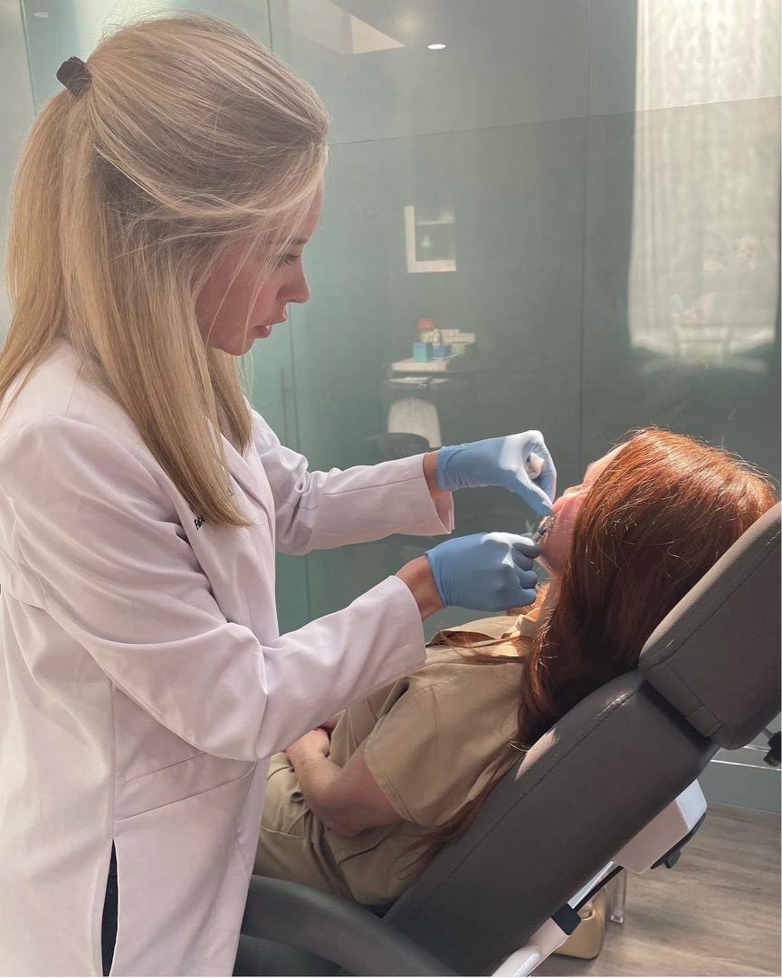 Nurse Kati Head, RN performing an injectable treatment at Kati Face Medical Spa in Yorkville, Toronto